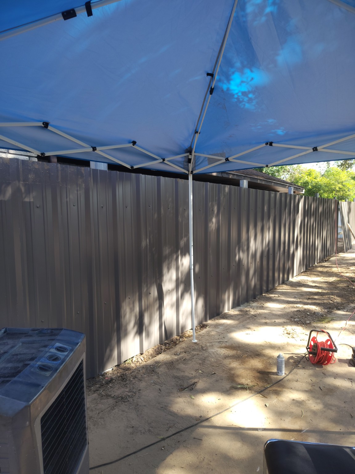 Custom steel privacy fence installed by ACES