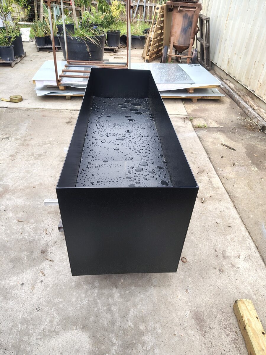 Custom fabricated black steel planter box